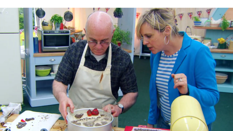 Mel watches as Brendan reveals his fraisier